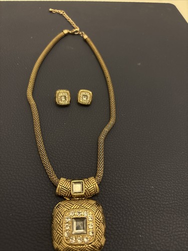 Old gold coloured necklace and - gold,