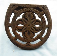CAST IRON FIRE FRONT SHELF.