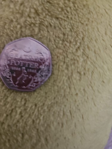 Fifty pence piece showin - showin, a