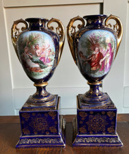 A Large pair of Royal Vienna Urn Vases hand painted beehive mark 1900-1919 28cm