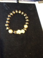 stunning vintage oriental gold metal & black stone Foo dog bracelet