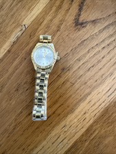 Ladies gold sekonda watch