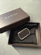 Gucci Money Receipts Clip. Brown Leather. Previously Owned. Good Condition.