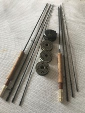 Two Shakespeare Expedition fly rods, reels and a bag of lines, flies etc.