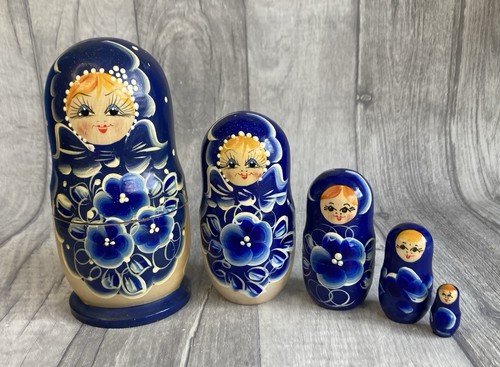 Hand painted wooden matryoshka - hand,