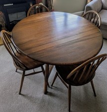 Ercol Round Dining Table with Drop Leaf Design and 4 Chairs, Read Description