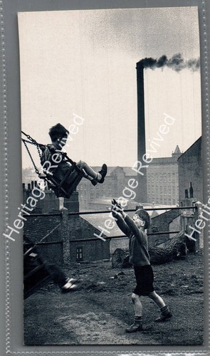 Leeds children playing swings - playing,