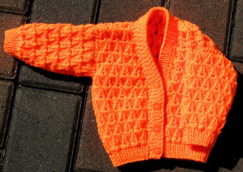 Hand knitted babies cardigan - hand,