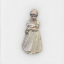 Figurine Child with Flowers by