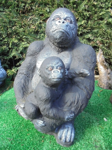 Gorilla with her baby - , concrete