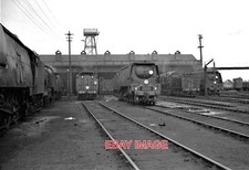 PHOTO  EXMOUTH JUNCTION  1962 TO THE LEFT IS UNREBUILT 'BATTLE OF BRITAIN' 34072