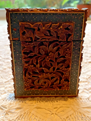 Ornately carved with sadeli - ornately,