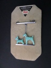 Superb chromium plated collared dogs brooch on Nuvo display card