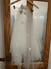 beautiful white wedding veil with flowers
