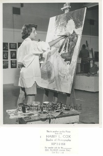 Young woman artist - by, easel
