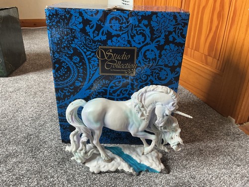 White unicorn figurine pure - white,