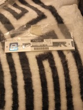 Genuine Nissan Emblem Rear