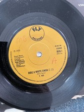 T.Rex…..  Ride a white swan