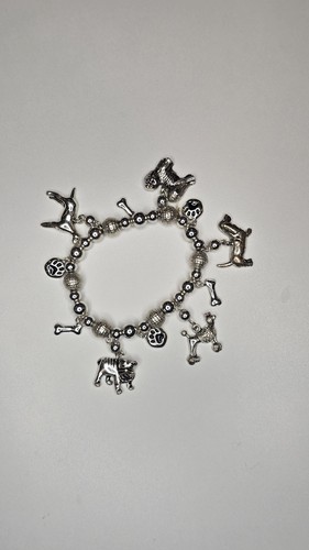 Dog charm bracelet featuring - dog,