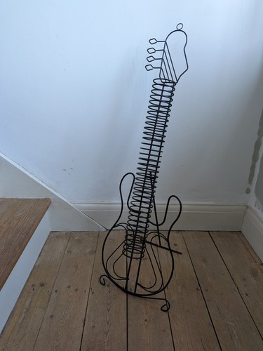 Metal guitar shaped rack - cd,