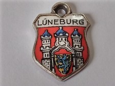 Silver travel shield charm