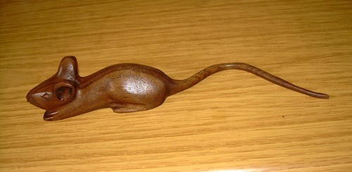 Hand carved wooden mouse - hand,