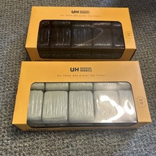 1/32 Universal Hobbies black and green wrapped silage bales