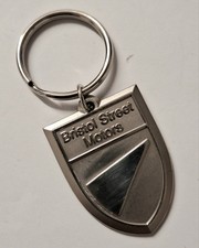 GENUINE VINTAGE BRISTOL STREET MOTORS MAIN DEALER METAL BADGE SHIELD KEYRING FOB