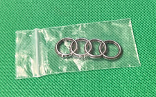 AUDI RINGS - CAR BADGE / EMBLEM 45 X 15 MM  - WILL REQUIRE NEW ADHESIVE TO REAR