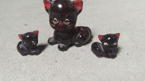 Brown ceramic cat with - brown,
