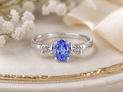 Natural oval blue tanzanite - natural, &