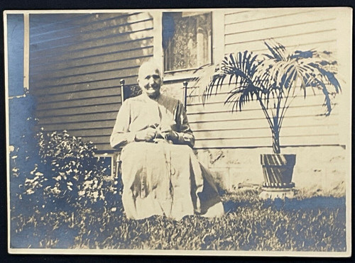 Old grandmother sitting in - old,