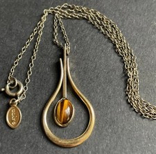 Vintage Avon, Made In Ireland Gold Tone With Tiger Eye Stone. 