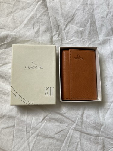 Omega wallet and key - and,