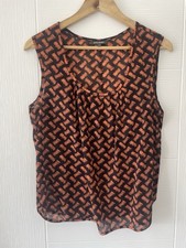 Emily and Fin Geometric Orange