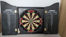 Vintage 1980's Winmau dartboard and Wooden cabinet with 3 sets of darts