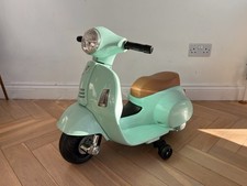 Electric ride on Vespa scooter