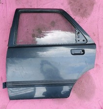 SIERRA SAPPHIRE COSWORTH ETC PASSENGER NEARSIDE REAR DOOR, INC GLASS TRIM MOTOR