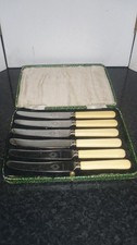 Vintage boxed set of 6 Faux handled Sheffield Butter Knives
