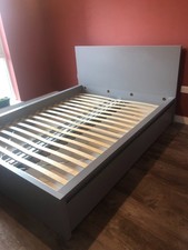 Grey Ikea Malm king-sized bedframe with Luroy slats and four under-bed drawers
