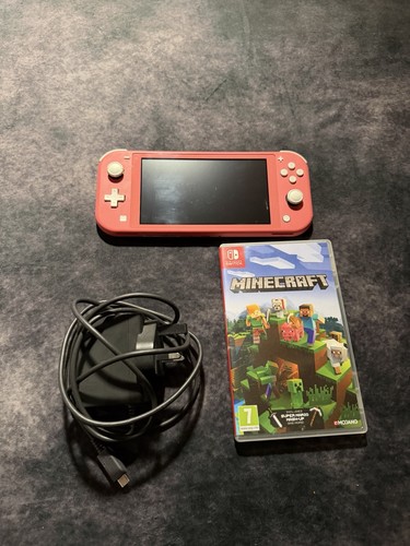 Nintendo switch lite coral - nintendo,