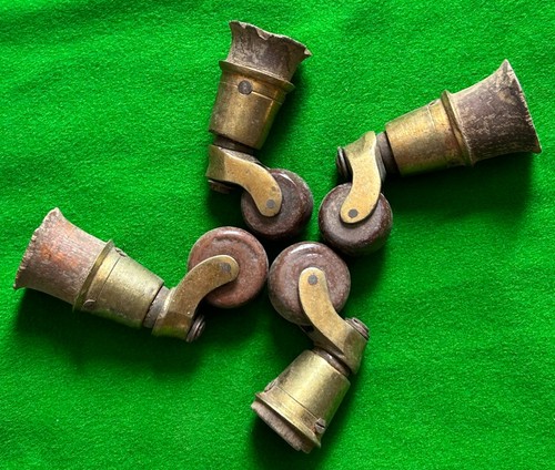 Set antique cup casters - of,