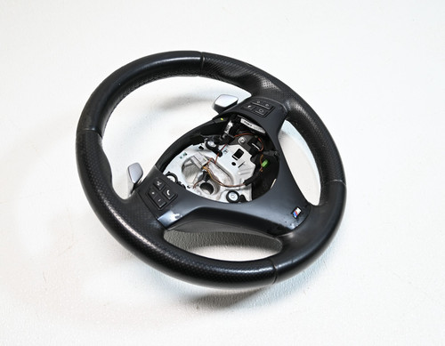 Driver side steering wheel - side,