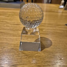 Crystal paperweight featuring