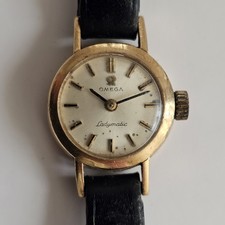 Vintage solid gold omega - solid,