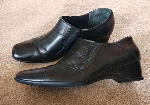 Clarks black leather slip - by,