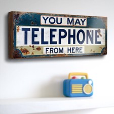 You May Telephone From Here