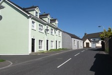 Photo 6x4 Houses behind the