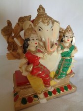 Two Thai ladys sitting on Buddha  Elephant Lap Beautiful Ornament Decoration