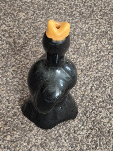 This vintage ceramic blackbird - this,